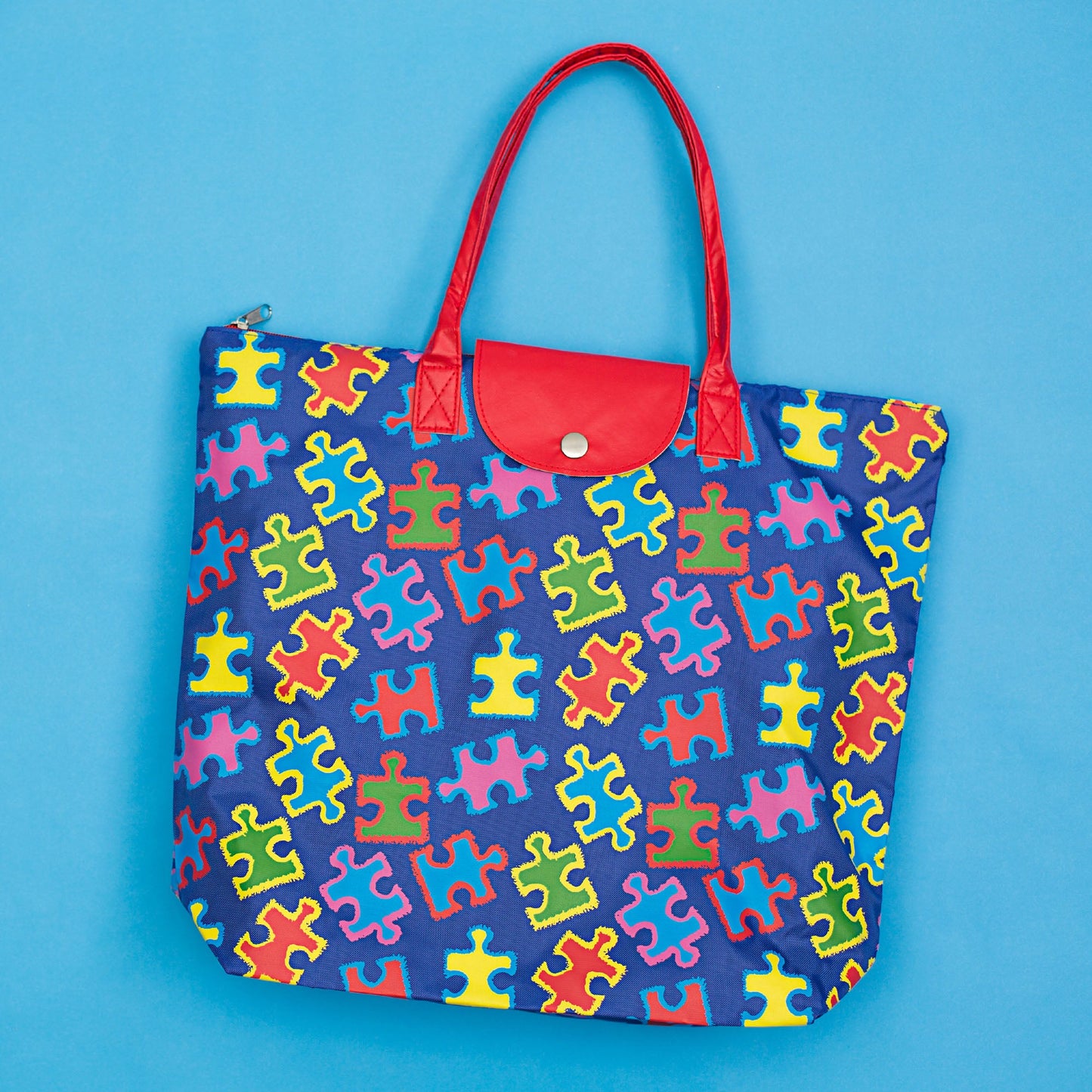 Free Spirit Puzzle Piece Packable Tote