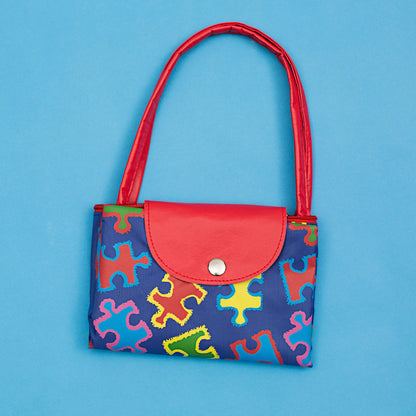 Free Spirit Puzzle Piece Packable Tote